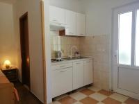 Kuchnia lub aneks kuchenny w obiekcie Apartments by the sea Cove Saplunara, Mljet - 4896