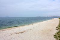 una playa de arena con el océano en el fondo en Apartments by the sea Bibinje, Zadar - 5786, en Bibinje