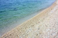 una playa rocosa con el océano en el fondo en Apartments by the sea Bibinje, Zadar - 5786, en Bibinje