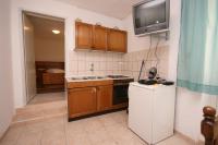 Kuchyňa alebo kuchynka v ubytovaní Apartments with a parking space Podgora, Makarska - 6682