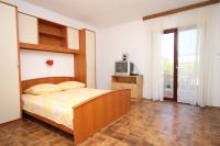 Posteľ alebo postele v izbe v ubytovaní Apartments by the sea Pag - 6526