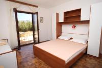 Posteľ alebo postele v izbe v ubytovaní Apartments by the sea Pag - 6526