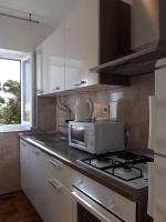 Kuchyňa alebo kuchynka v ubytovaní Apartments by the sea Pag - 6526