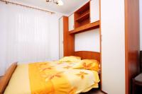 Posteľ alebo postele v izbe v ubytovaní Apartments by the sea Drvenik Donja vala, Makarska - 6701