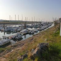 a bunch of boats are docked in a harbor at LE GALOPIN Etaples le Touquet in Étaples