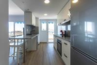 Kuchyňa alebo kuchynka v ubytovaní Lisasol Apartamento nuevo con vistas al mar
