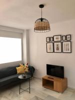 Televízia a/alebo spoločenská miestnosť v ubytovaní Apartamento en el Centro de Málaga