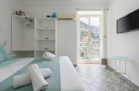 Televízia a/alebo spoločenská miestnosť v ubytovaní Nautilus House