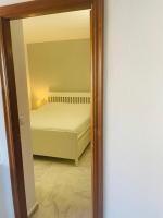 Postel nebo postele na pokoji v ubytování Beach apartament in Torrevieja