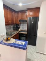 Kuchyň nebo kuchyňský kout v ubytování Beach apartament in Torrevieja