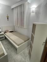Postel nebo postele na pokoji v ubytování Beach apartament in Torrevieja