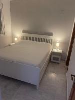 Postel nebo postele na pokoji v ubytování Beach apartament in Torrevieja