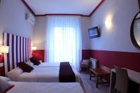 Postel nebo postele na pokoji v ubytování Hostal Oriente