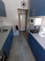 Kuchyň nebo kuchyňský kout v ubytování Apartamento, dos dormitorios, tipo ático cerca del centro