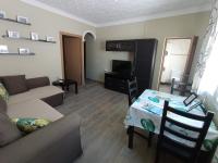 TV a/nebo společenská místnost v ubytování Apartamento, dos dormitorios, tipo ático cerca del centro