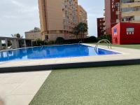 Bazén v ubytovaní Estudios HORIZONTE BEACH alebo v jeho blízkosti