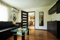Televízia a/alebo spoločenská miestnosť v ubytovaní Apartament Szczecinek - Spokojna okolica