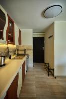 Kuchyňa alebo kuchynka v ubytovaní Apartament Szczecinek - Spokojna okolica