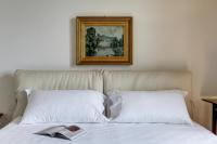 Łóżko lub łóżka w pokoju w obiekcie Villa Vetta Marina - My Extra Home