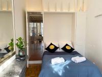Ein Bett oder Betten in einem Zimmer der Unterkunft Canal Hideaway
