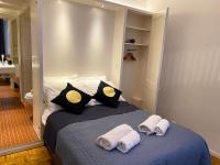 Ein Bett oder Betten in einem Zimmer der Unterkunft Canal Hideaway