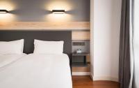 Postel nebo postele na pokoji v ubytování Hotel Alda Centro Gijón