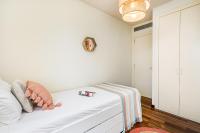 Postel nebo postele na pokoji v ubytování Lodging Apartments Forum Llull