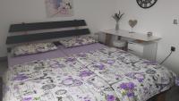 Posteľ alebo postele v izbe v ubytovaní Apartman GRIZZLY