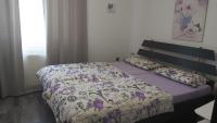 Posteľ alebo postele v izbe v ubytovaní Apartman GRIZZLY