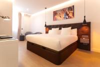Postel nebo postele na pokoji v ubytování Woohoo Rooms Boutique Sol