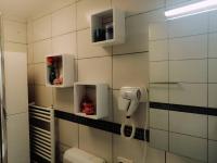 Kúpeľňa v ubytovaní APARTMAN D&D***