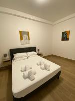 Postel nebo postele na pokoji v ubytování Art Atelier Apartments