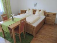 Łóżko lub łóżka w pokoju w obiekcie Sixtl, Landhaus