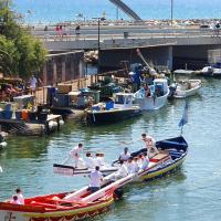 a group of people riding in boats in the water at Superbe vue sur mer à Sète in Sète