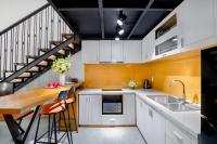 Flexi Hotel & Apartmentにあるキッチンまたは簡易キッチン