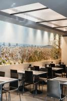 Reštaurácia alebo iné gastronomické zariadenie v ubytovaní Hotel Travessera