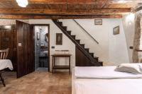 Postel nebo postele na pokoji v ubytování Casa-Pietra Porec