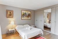 Łóżko lub łóżka w pokoju w obiekcie Appartement Barrio - Welkeys