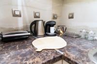 Príslušenstvo na prípravu kávy alebo čaju v ubytovaní Eclectic Luxury Studio (Egnatias str)