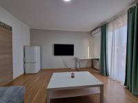Televízia a/alebo spoločenská miestnosť v ubytovaní Family Apartment in Dramalj (Crikvenica)