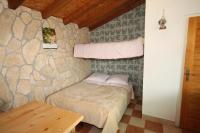 Postel nebo postele na pokoji v ubytování Secluded holiday house Nevidjane, Pasman - 8529