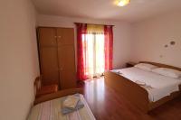 Posteľ alebo postele v izbe v ubytovaní Apartments by the sea Dobropoljana, Pasman - 8198