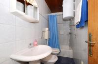 Kúpeľňa v ubytovaní Apartment Arbanija 8651d