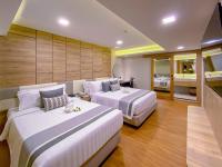Ein Sitzbereich in der Unterkunft Phuket Graceland Resort and Spa
