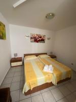 Posteľ alebo postele v izbe v ubytovaní Apartments Zlosilo