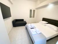 Postel nebo postele na pokoji v ubytování Art Atelier Apartments