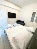 Postel nebo postele na pokoji v ubytování Art Atelier Apartments