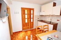 Kuchyň nebo kuchyňský kout v ubytování Apartments by the sea Kastel Stafilic, Kastela - 11539