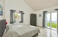 Posteľ alebo postele v izbe v ubytovaní 1 Bedroom Nice Apartment In Saplunara
