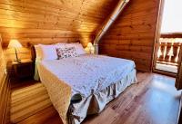 Łóżko lub łóżka w pokoju w obiekcie Chalet cosy au cœur du Dévoluy avec vue magnifique
